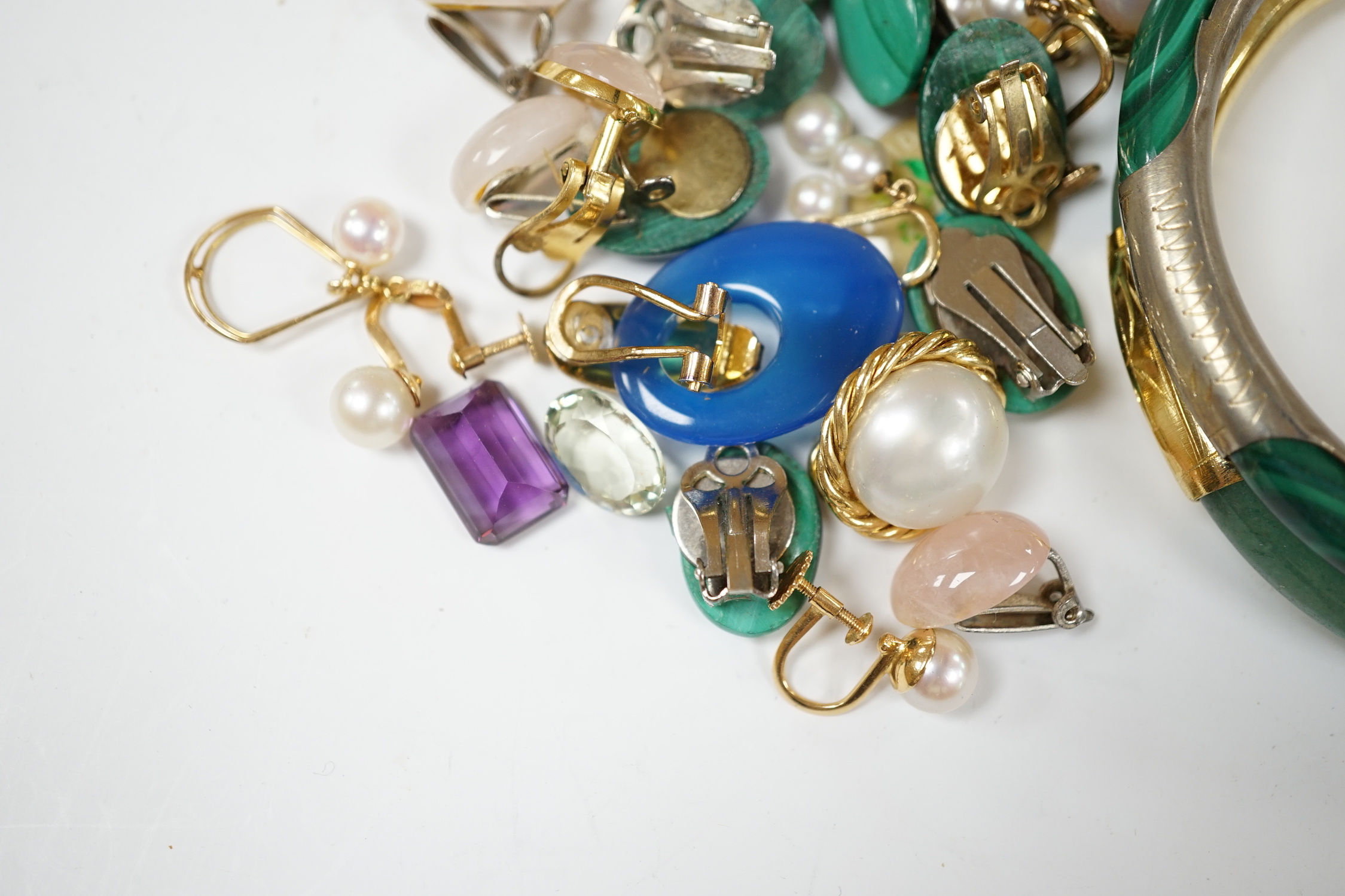 A pair of 14k and three stone cultured pearl set drop ear clips, 23mm, a pair of 18k and single stone cultured pearl set ear clips, a quantity of assorted costume ear clips and two bangles etc.